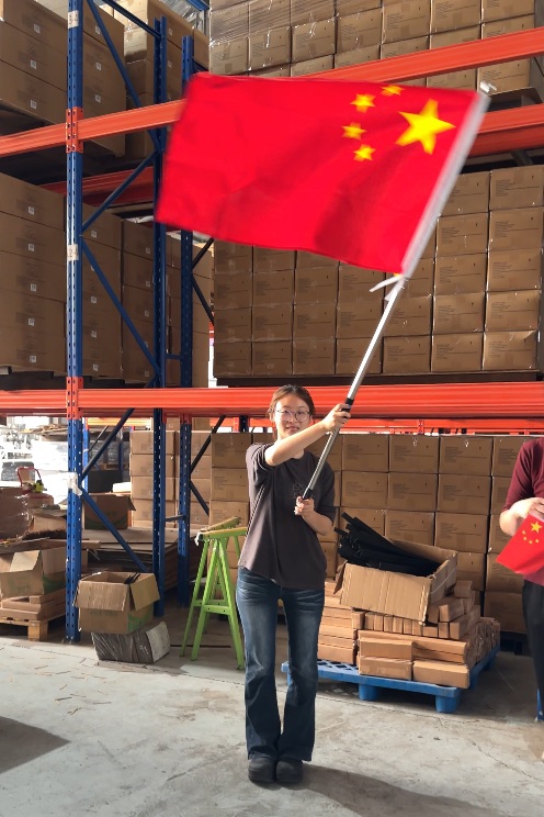 Factory colleagues celebrate together.